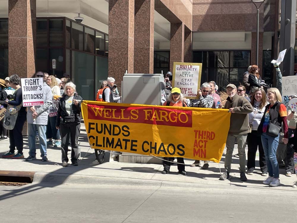 Third Act members with banner at Wells Fargo Plaza
